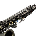 Vintage black alto saxophone with polished finish and abalone shell buttons, front view