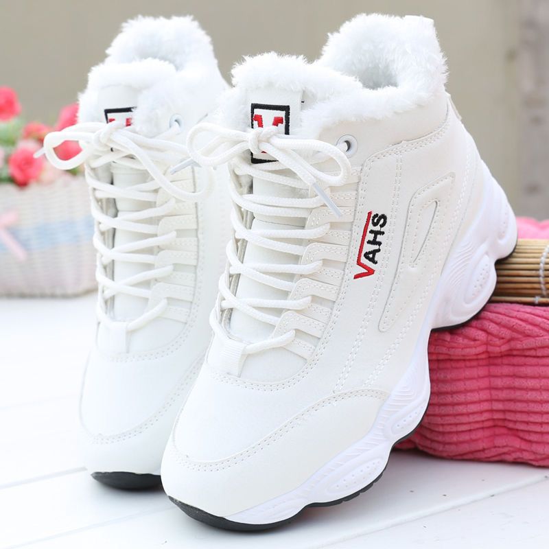 Plush-lined high-top sneaker showing the faux leather-look upper and casual streetwear design