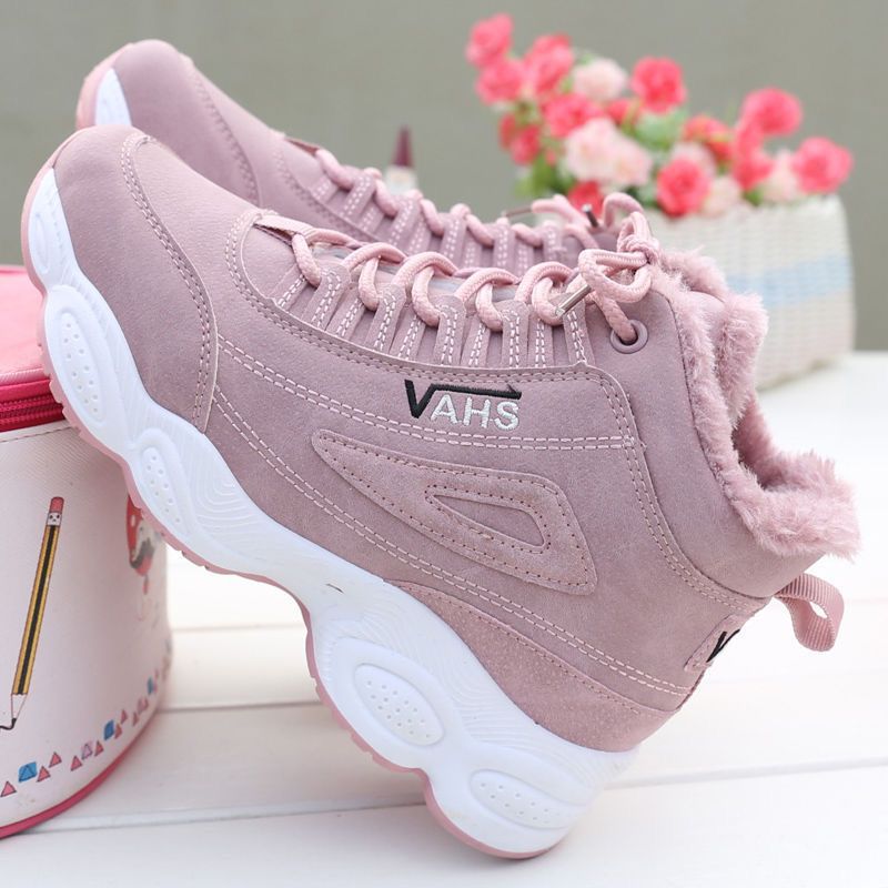 Pink plush-lined high-top casual sneaker with lace-up front and chunky white sole