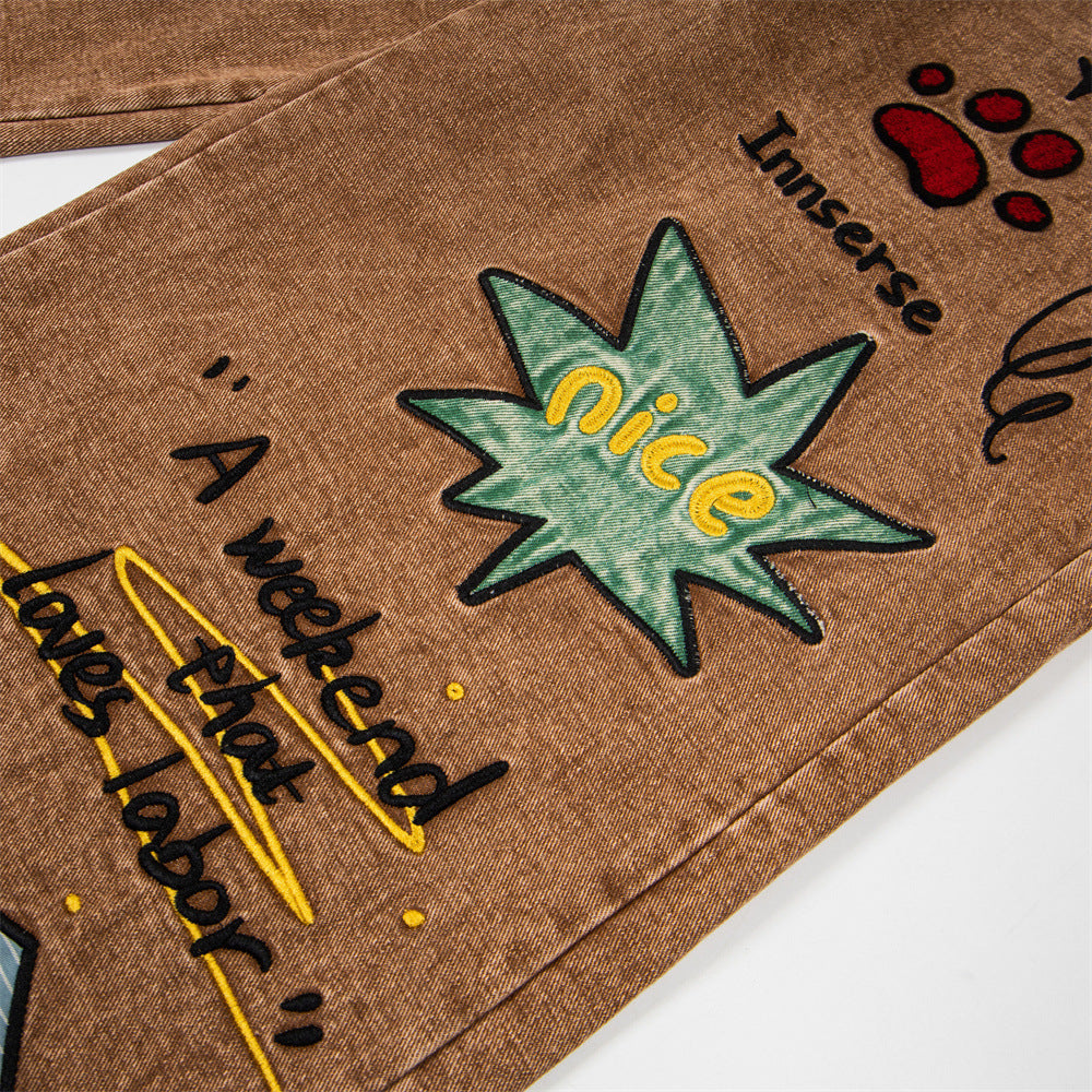 Embroidered washed denim jeans
