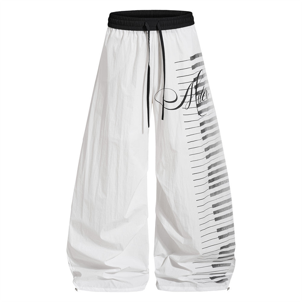 Piano key note printing curved knife wide leg pants product photo