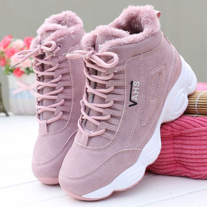 Chunky-sole high-top casual sneakers designed for cozy cool-weather outfits