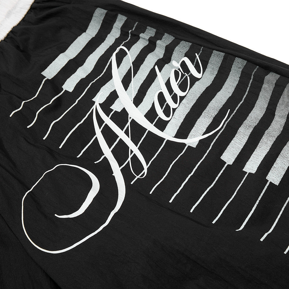 Piano key note printing curved knife wide leg pants product photo
